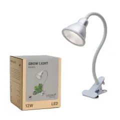 En vit LED-växtlampa med klämma och en kartong för "GROW LIGHT FLEXIA". Perfekt för att ge dina växter rätt ljus, som en timer till lampor.